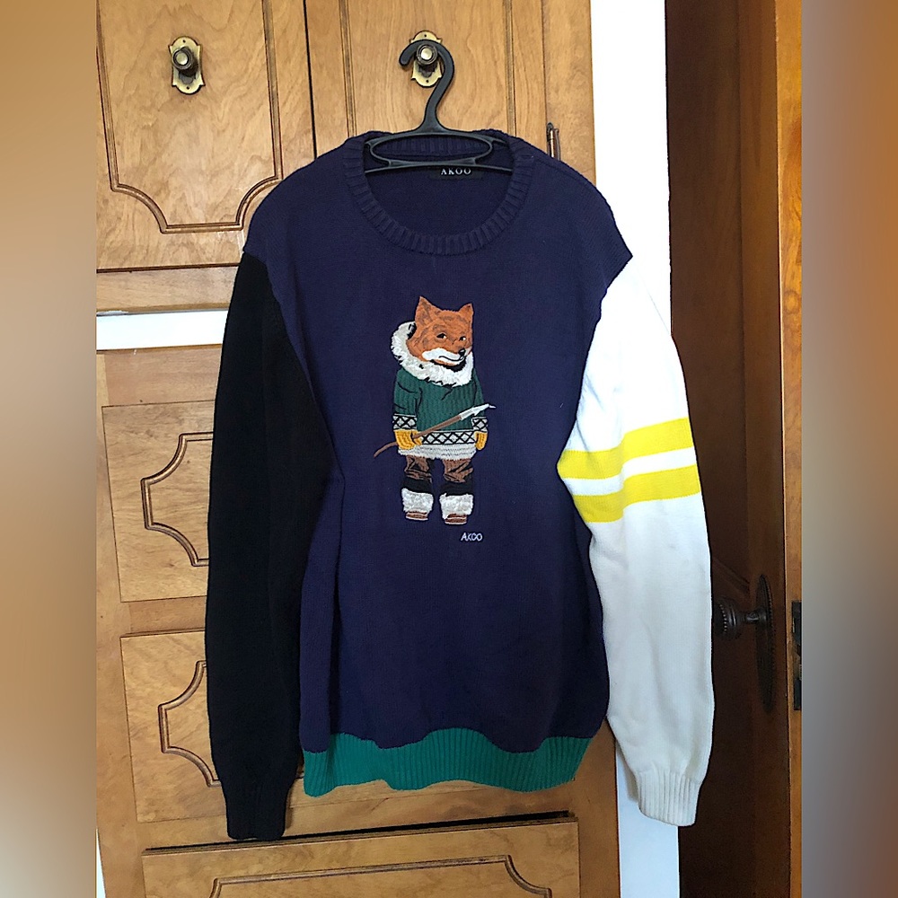AKOO knit sweater with embroidered spear hunting fox.